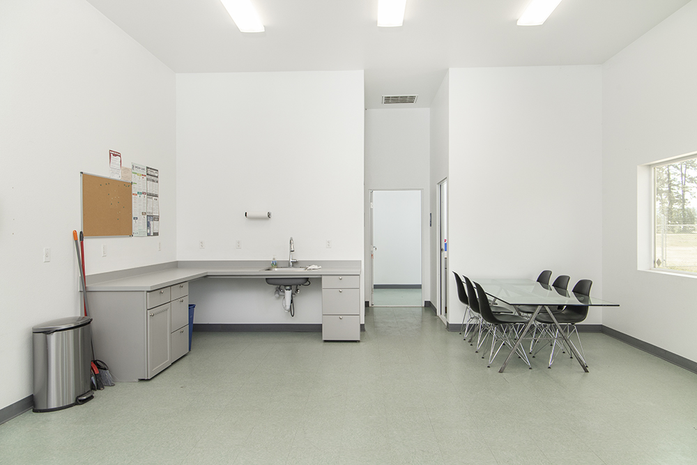 Private office space ideal for administrative or compliance functions, client check-ins, or business operations.