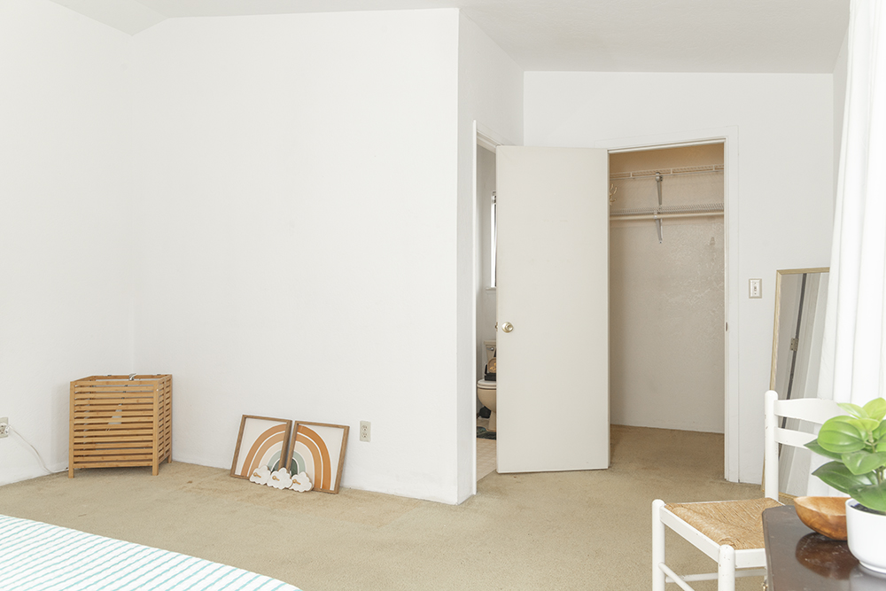 Spacious upstairs bedroom offers comfort, privacy, and a calming retreat.